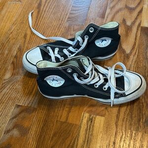Converse women’s Black and White High-Top Sneakers